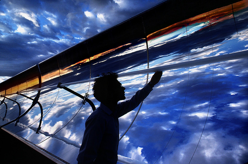 Image of person with solar panel